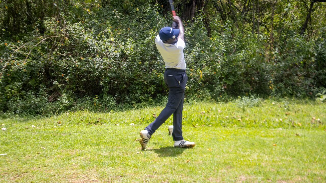 Rain or Shine, the Golf Tornament Action Continued